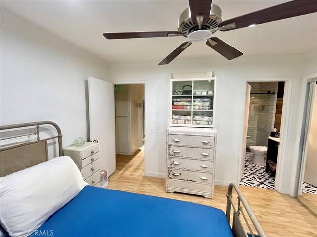 5001 Stoney Creek Rd Unit 356, Culver City, CA 90230 - bedroom with light wood-style flooring, a ceiling fan, and ensuite bath