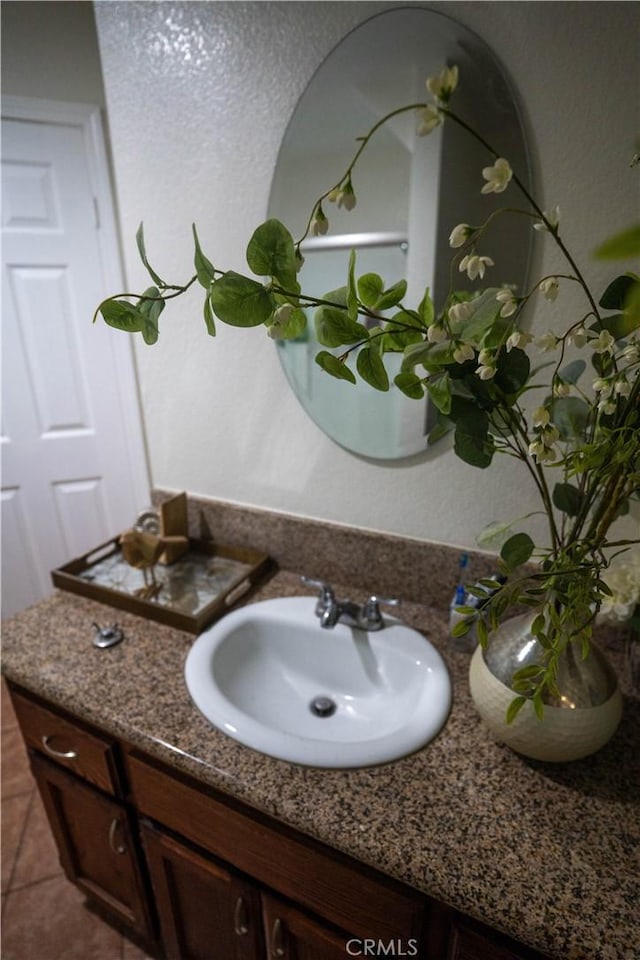 bathroom featuring vanity and tile patterned floors