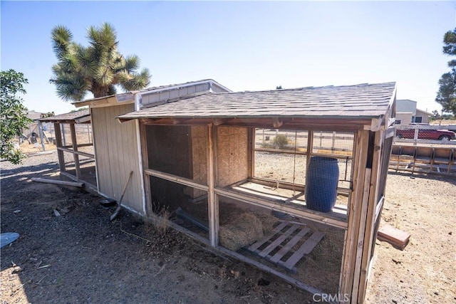 view of outbuilding with an exterior structure and an outdoor structure