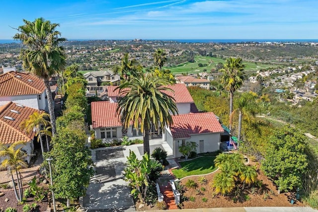 birds eye view of property with a residential view