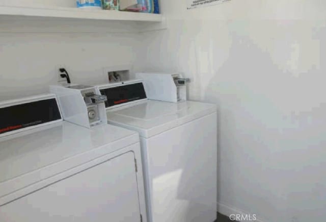 common laundry area featuring washer and clothes dryer