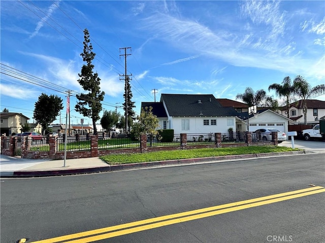 view of front of property with a fenced front yard and a residential view