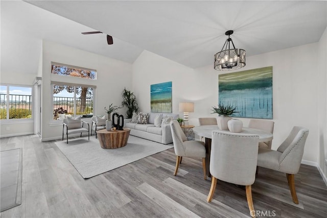 27557 Paseo Tamara, San Juan Capistrano, CA 92675 - dining space with wood finished floors, baseboards, and ceiling fan with notable chandelier