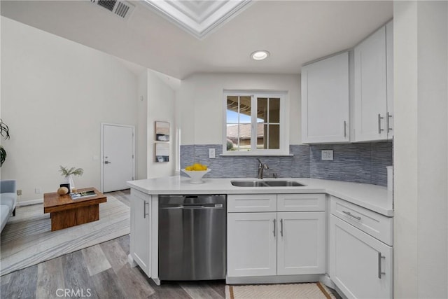 27557 Paseo Tamara, San Juan Capistrano, CA 92675 - kitchen featuring light countertops, a sink, visible vents, and stainless steel dishwasher
