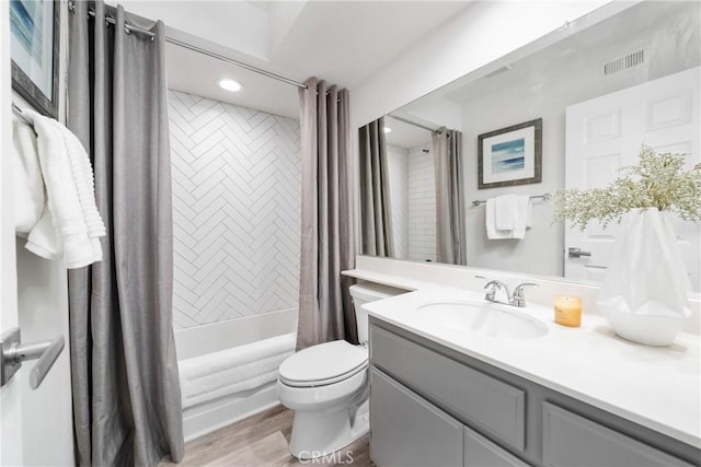 27557 Paseo Tamara, San Juan Capistrano, CA 92675 - full bath featuring toilet, wood finished floors, vanity, visible vents, and shower / bath combination with curtain