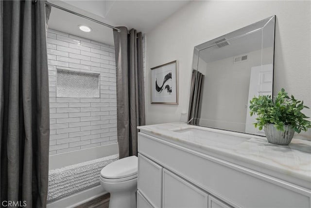 27557 Paseo Tamara, San Juan Capistrano, CA 92675 - bathroom with shower / bath combination with curtain, toilet, wood finished floors, visible vents, and vanity