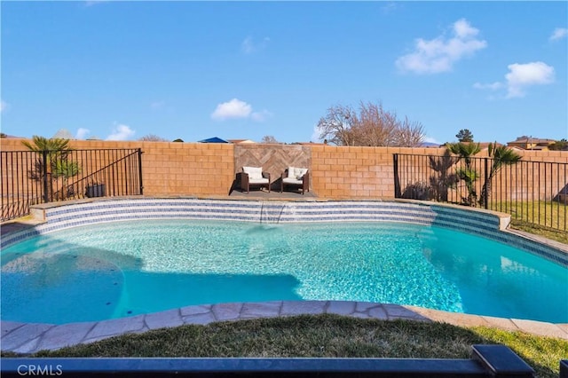 view of swimming pool with a fenced backyard and a fenced in pool