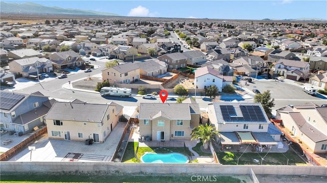 aerial view featuring a mountain view and a residential view