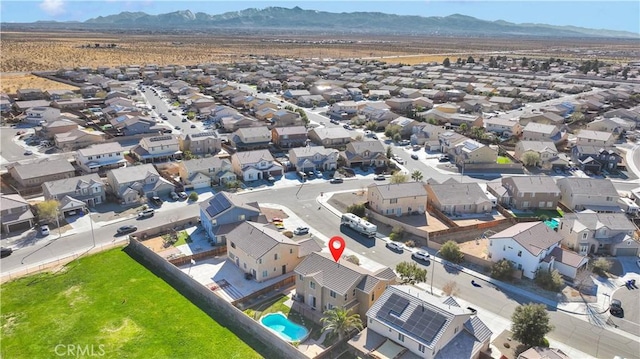 bird's eye view featuring a residential view and a mountain view