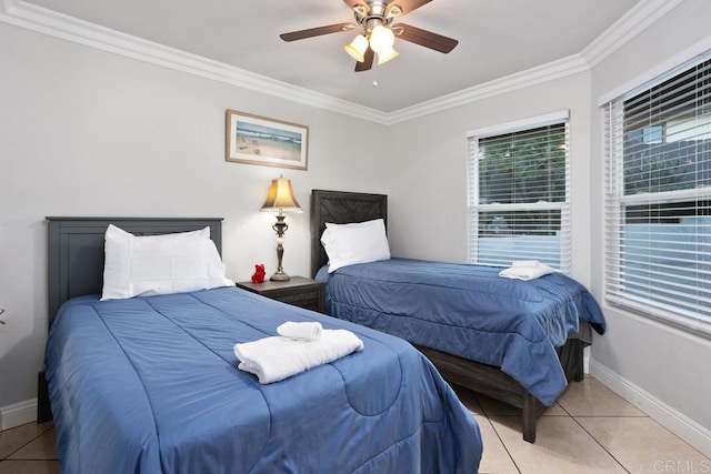 bedroom featuring light tile patterned floors, baseboards, ornamental molding, and ceiling fan