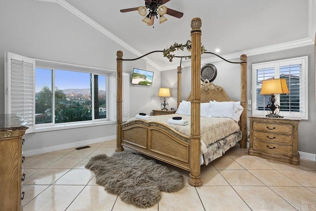 bedroom featuring lofted ceiling, light tile patterned floors, baseboards, and ornamental molding