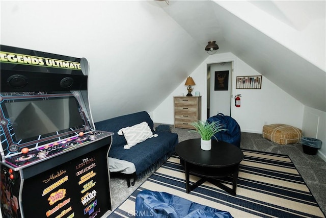 interior space featuring carpet floors and vaulted ceiling