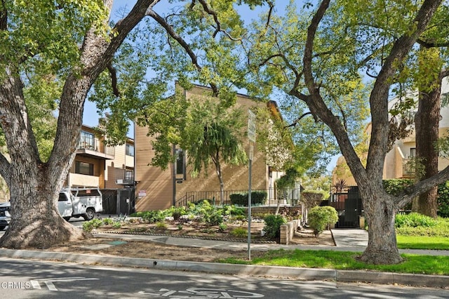 exterior space with a gate and fence