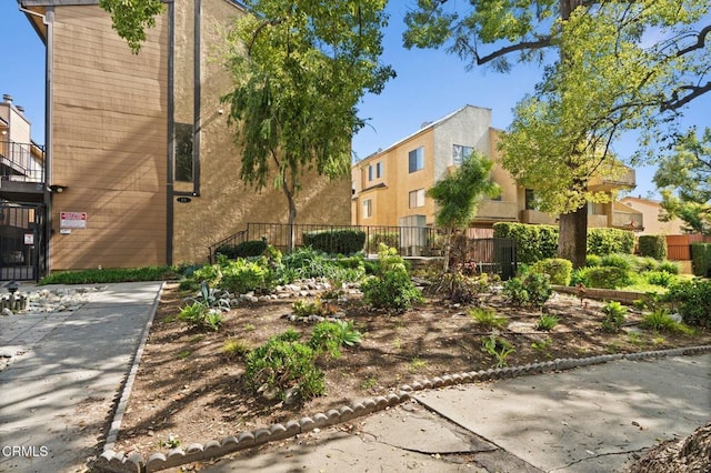 view of property featuring fence