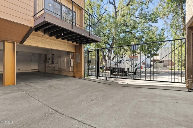 view of gate featuring fence