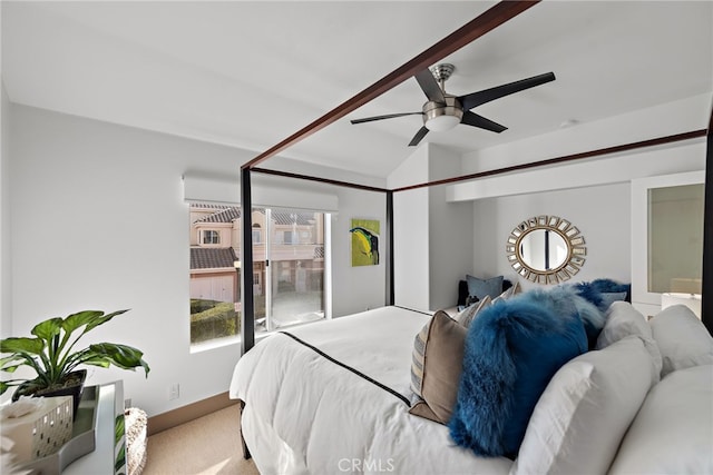 bedroom with a ceiling fan and vaulted ceiling