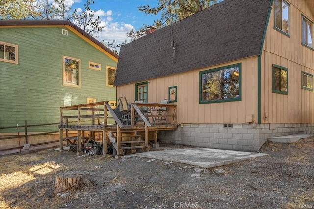 5768 Heath Creek Dr, Wrightwood, CA 92397 - rear view of property with a shingled roof, fence, crawl space, and a deck