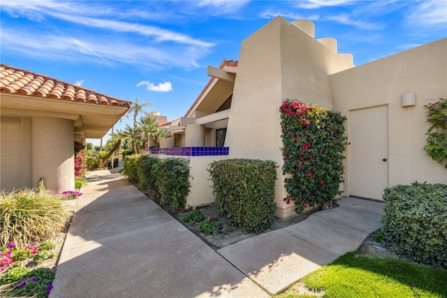 232 Kavenish Dr W, Rancho Mirage, CA 92270 - view of property exterior with stucco siding