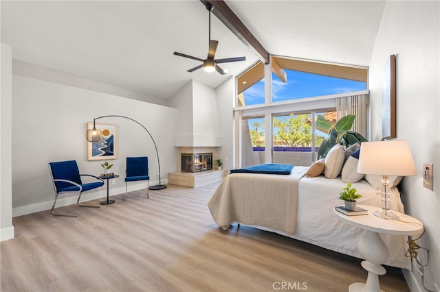 232 Kavenish Dr W, Rancho Mirage, CA 92270 - bedroom featuring baseboards, wood finished floors, and beam ceiling