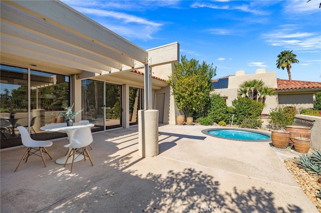 pool featuring a patio area