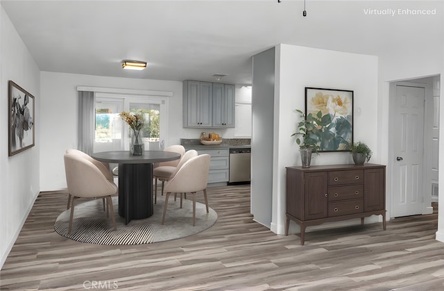 dining room featuring light wood-style flooring