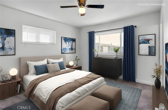 carpeted bedroom featuring a ceiling fan and baseboards