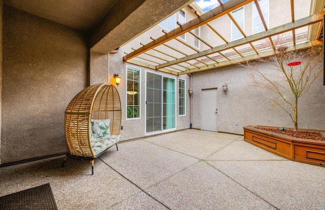 view of patio featuring a pergola