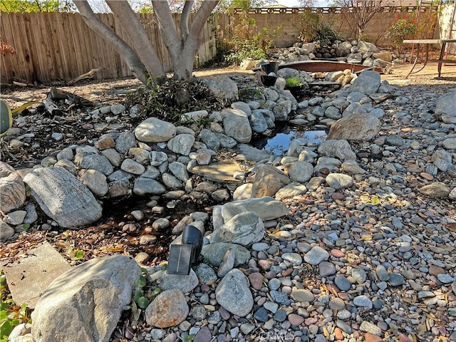 exterior details featuring fence