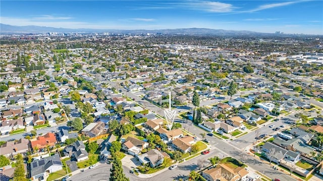 bird's eye view featuring a residential view and a mountain view