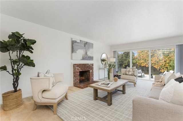 living room with light carpet and a fireplace