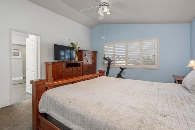 carpeted bedroom with vaulted ceiling, a ceiling fan, and baseboards