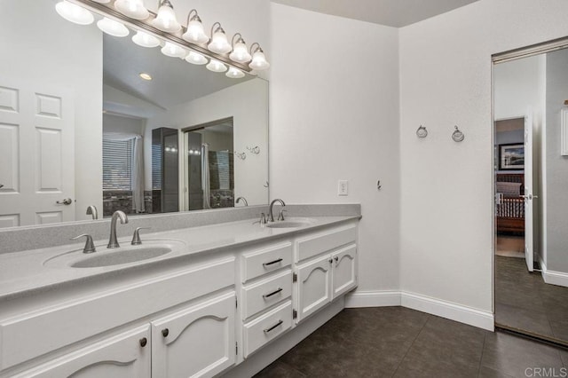 full bathroom featuring tile patterned flooring, a sink, lofted ceiling, and double vanity