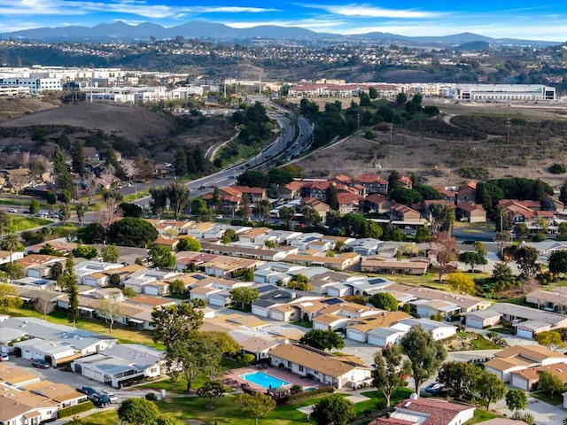 aerial view featuring a residential view and a mountain view