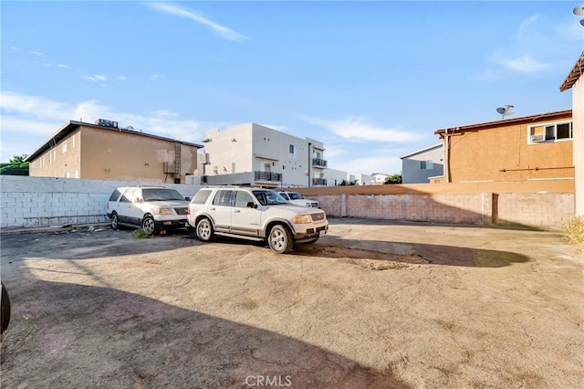 view of yard featuring a residential view and fence