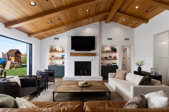 living area featuring a brick fireplace, wooden ceiling, beamed ceiling, and visible vents