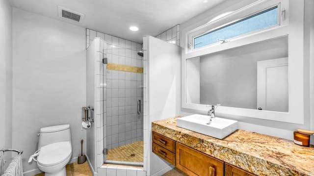 full bathroom with a stall shower, visible vents, toilet, vanity, and recessed lighting