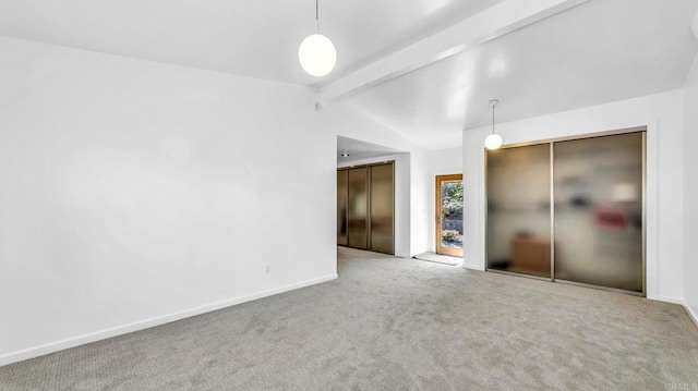 unfurnished bedroom featuring lofted ceiling with beams, carpet, elevator, and baseboards