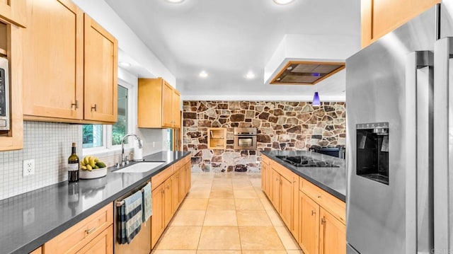 kitchen featuring appliances with stainless steel finishes, wine cooler, dark countertops, and a sink