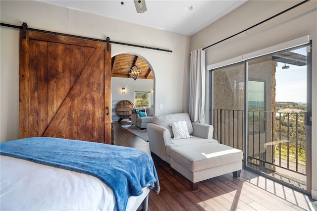 38270 Calaveras Rd, Temecula, CA 92592 - bedroom featuring a barn door, wood finished floors, access to outside, and arched walkways