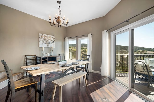38270 Calaveras Rd, Temecula, CA 92592 - dining space featuring a chandelier, dark wood-type flooring, and baseboards