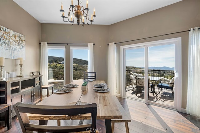 38270 Calaveras Rd, Temecula, CA 92592 - dining space featuring plenty of natural light, a chandelier, wood finished floors, and a mountain view