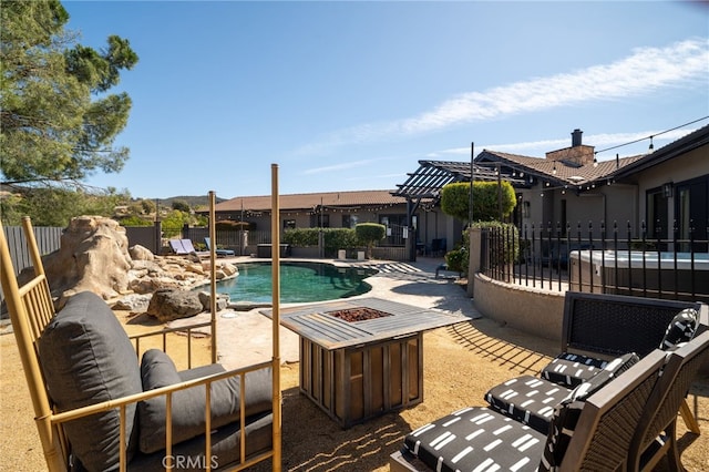 view of pool featuring a fenced in pool, a patio, a fire pit, and a fenced backyard