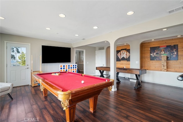 recreation room with recessed lighting, wood finished floors, visible vents, and wood walls