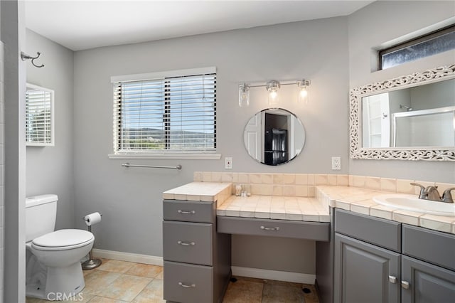 38270 Calaveras Rd, Temecula, CA 92592 - full bath with vanity, toilet, a shower with shower door, and baseboards