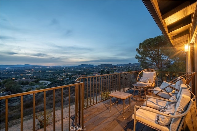 wooden terrace with a mountain view