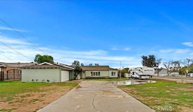 970 3rd St, Norco, CA 92860 - view of front facade featuring a garage and concrete driveway