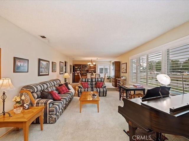 970 3rd St, Norco, CA 92860 - carpeted living area featuring a chandelier