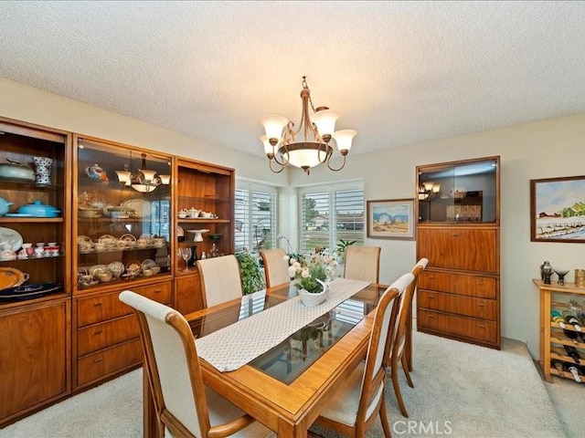 970 3rd St, Norco, CA 92860 - dining room with a chandelier, light colored carpet, and a textured ceiling