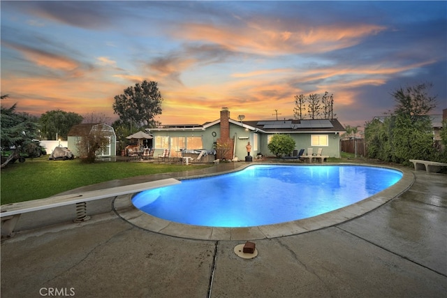 970 3rd St, Norco, CA 92860 - pool at dusk with a patio area and a diving board