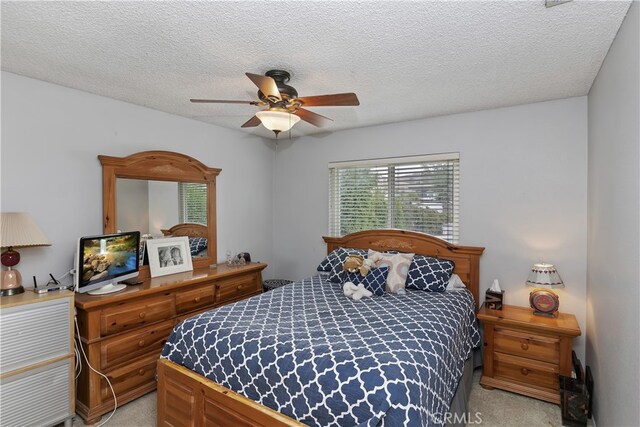 970 3rd St, Norco, CA 92860 - bedroom with light carpet, a textured ceiling, and a ceiling fan